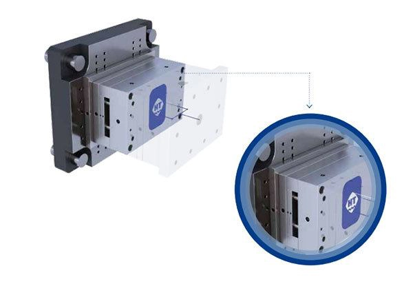 Co_injection Industrial precision linear motion stage with a metallic housing and mounting holes; a circular magnified inset emphasizes the mounting surface and blue logo on the side.